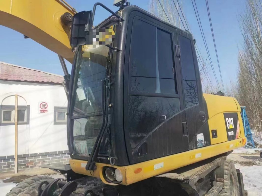 কাজ করার জন্য প্রস্তুত Caterpillar M315D কম কাজের ঘন্টা এবং ভাল অবস্থায় ব্যবহৃত চাকা খননকারী