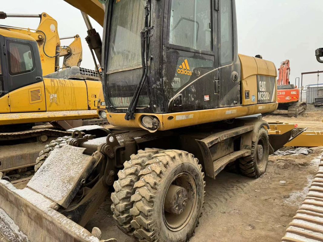 90% Caterpillar M317D2 বিক্রয়ের জন্য উচ্চ মানের এবং সেরা কর্মক্ষমতা সঙ্গে ব্যবহৃত চাকা খননকারী