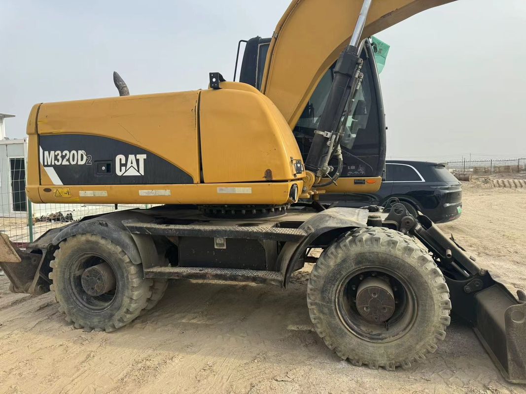 90% Caterpillar M317D2 বিক্রয়ের জন্য উচ্চ মানের এবং সেরা কর্মক্ষমতা সঙ্গে ব্যবহৃত চাকা খননকারী