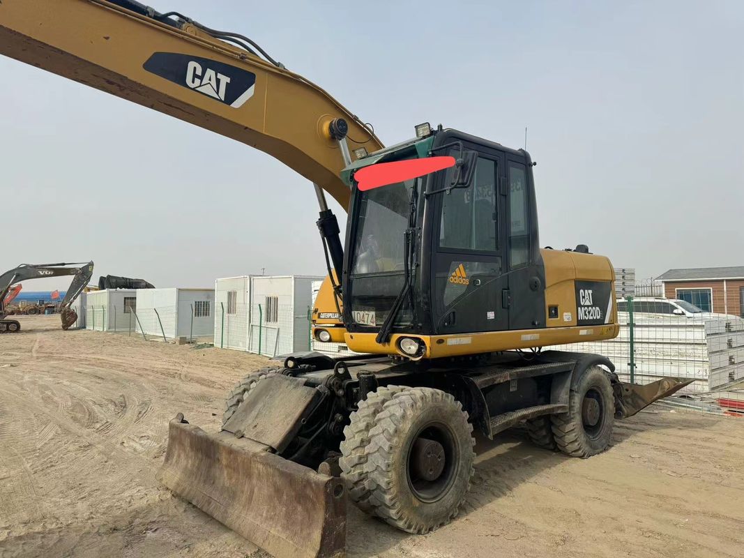 90% Caterpillar M317D2 বিক্রয়ের জন্য উচ্চ মানের এবং সেরা কর্মক্ষমতা সঙ্গে ব্যবহৃত চাকা খননকারী