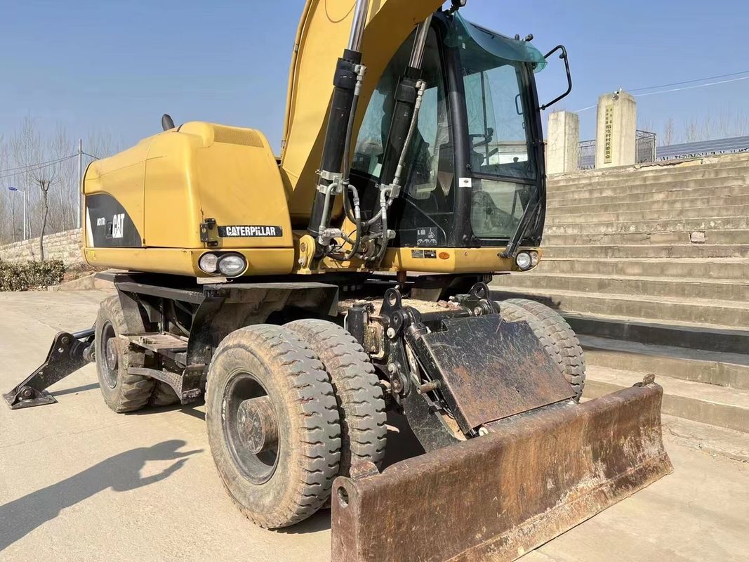 90% Caterpillar M317D2 বিক্রয়ের জন্য উচ্চ মানের এবং সেরা কর্মক্ষমতা সঙ্গে ব্যবহৃত চাকা খননকারী